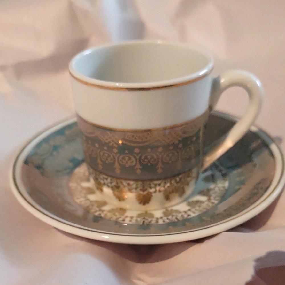 Elegant Gold and Green Teacup and Saucer Set
